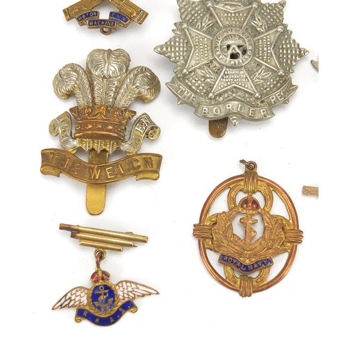 187 - Military interest cap badges, cloth insignia and a German medal including Sheffield University, Midd... 