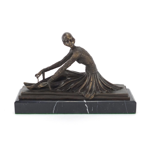 2126 - Art Deco style bronze study of a seated ballerina tying her shoes, raised on a rectangular marble ba... 