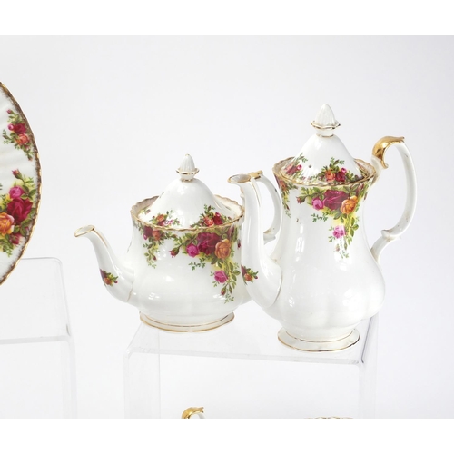 2089 - Royal Albert old country roses tea and dinnerware including  teapot and coffee pot, the largest 23cm... 