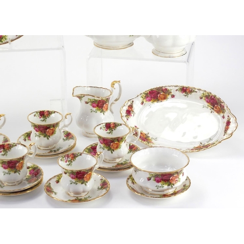 2089 - Royal Albert old country roses tea and dinnerware including  teapot and coffee pot, the largest 23cm... 