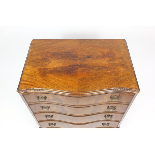 2027 - Walnut serpentine fronted four drawer chest with quarter veneer top, 81.5cm H x 70cm W x 45.5cm D