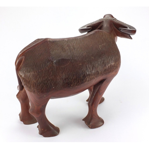 2147 - Large Chinese carved wooden water buffalo, 67cm in length