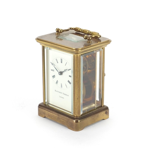 2125 - Brass cased carriage clock by Matthew Norman, 11cm high