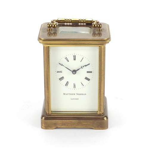 2125 - Brass cased carriage clock by Matthew Norman, 11cm high