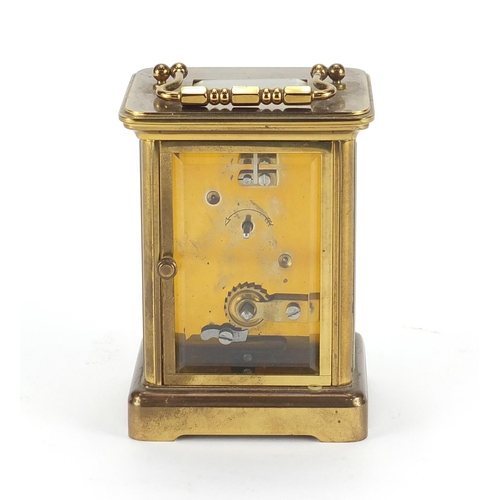 2125 - Brass cased carriage clock by Matthew Norman, 11cm high