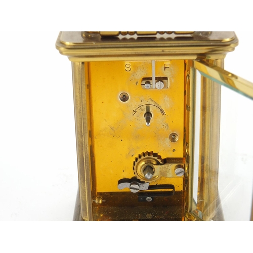 2125 - Brass cased carriage clock by Matthew Norman, 11cm high