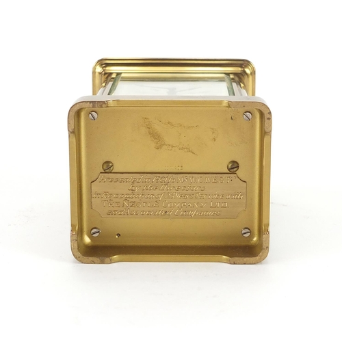 2125 - Brass cased carriage clock by Matthew Norman, 11cm high