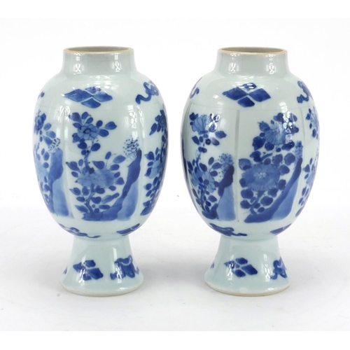 271 - Pair of Chinese blue and white pedestal vases, possibly Kangxi period, hand painted with panels of f... 