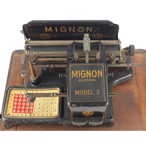 26 - German Mignon model 2 typewriter with dome topped carrying case, serial number 43033, 40cm wide