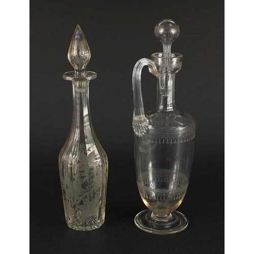 473 - 19th century glass decanter etched with vines together with a good quality claret jug with coat of a... 