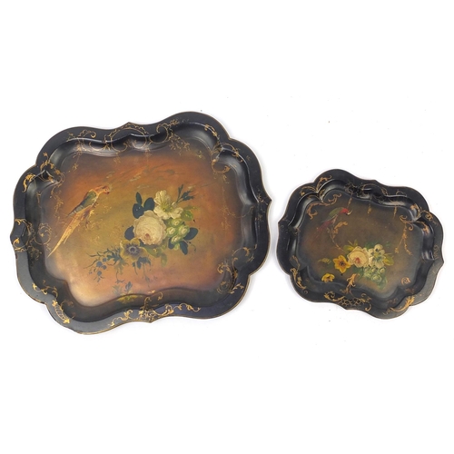 25 - Two Victorian lacquered paper Mache trays, both hand painted and gilded with parrots and flowers, th... 