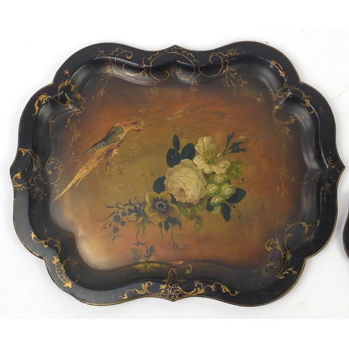 25 - Two Victorian lacquered paper Mache trays, both hand painted and gilded with parrots and flowers, th... 