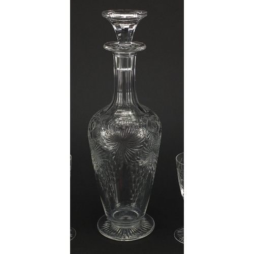477 - Good quality cut glass decanter and six glasses with leaf and berry decoration, the decanter 32cm hi... 