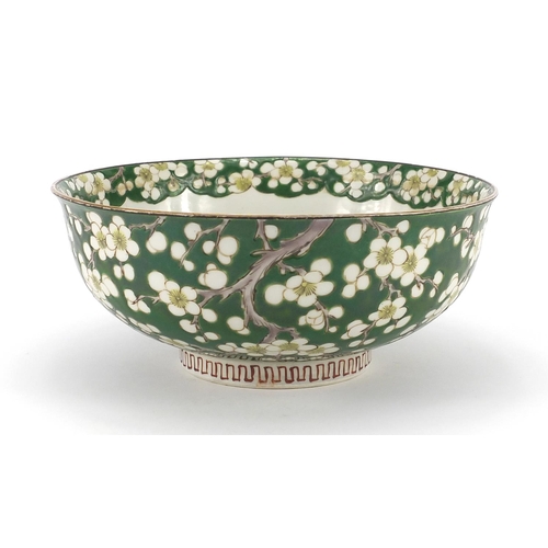 246 - Chinese porcelain bowl, hand painted with flowers onto a green ground, character marks to the base, ... 