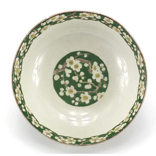246 - Chinese porcelain bowl, hand painted with flowers onto a green ground, character marks to the base, ... 