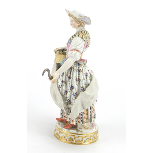 429 - 19th century hand painted Meissen porcelain figurine of a gardener holding her dress and a basket of... 