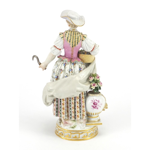 429 - 19th century hand painted Meissen porcelain figurine of a gardener holding her dress and a basket of... 