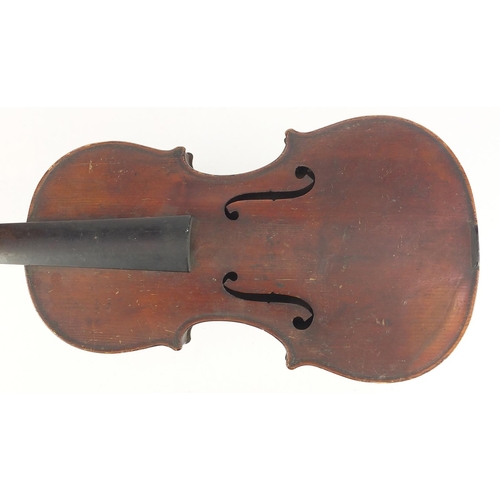 40 - Old wooden violin with one piece back, scrolled neck and Medio-Fino label to the interior, 54cm in l... 