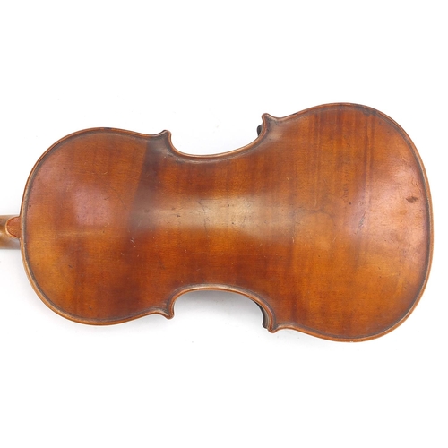40 - Old wooden violin with one piece back, scrolled neck and Medio-Fino label to the interior, 54cm in l... 