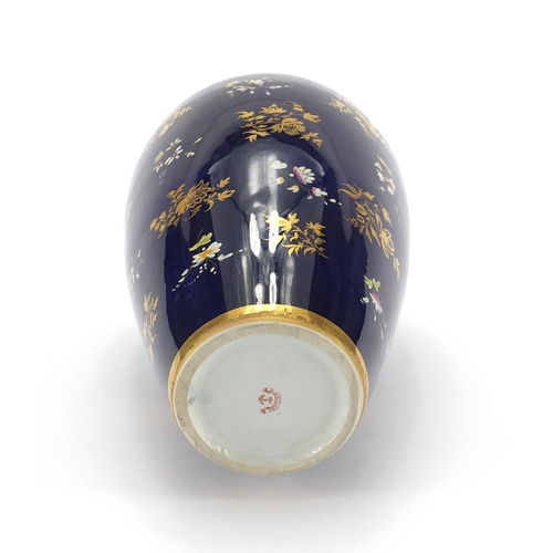 445 - 19th century Davenport porcelain vase sparsely hand painted and gilded with flowers onto a blue grou... 