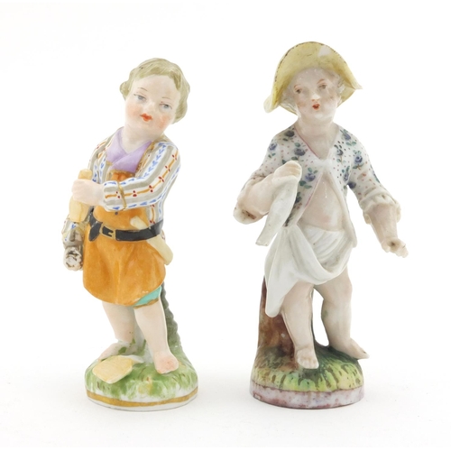 431 - Continental hand painted Berlin porcelain model of a cherub, together with a hand painted continenta... 