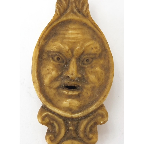 4 - Antique continental marble oil lamp carved with grotesque face, 12cm wide