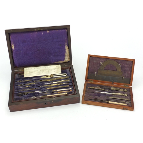 60 - Victorian rosewood drawing instrument set with brass inlay together with an oak example, both housin... 