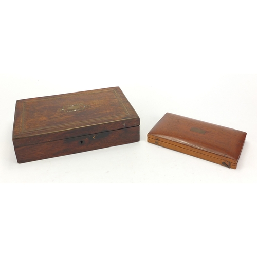 60 - Victorian rosewood drawing instrument set with brass inlay together with an oak example, both housin... 