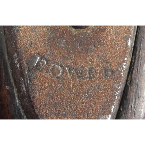 215 - Antique flint lock pistol with brass mounts, engraved Tower, GR emblem and proof marks, initialled T... 