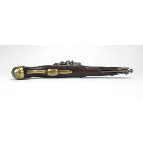 215 - Antique flint lock pistol with brass mounts, engraved Tower, GR emblem and proof marks, initialled T... 