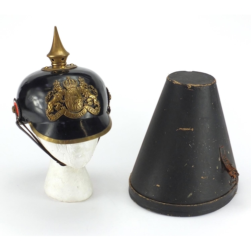 194 - German Military Pickelhaube with fitted case applied brass badge and chin strap, the pickelhaube 24c... 