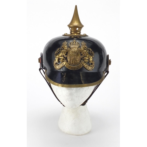 194 - German Military Pickelhaube with fitted case applied brass badge and chin strap, the pickelhaube 24c... 