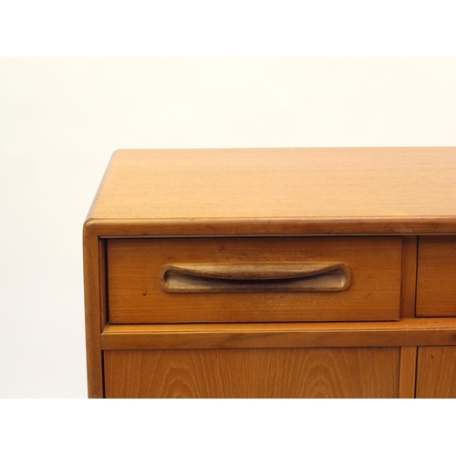 2039 - 1970's G-plan teak sideboard with three drawers above four cupboard doors, 85cm H x 152cm W x 46cm D