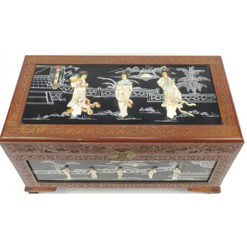 2032 - Chinese Camphorwood and Mother of Pearl trunk, decorated and hand painted with figures in a court se... 