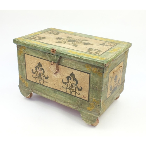 2050 - Dowry style trunk with twin carrying handles, hand painted with flowers, with wooden wheels, 53cm H ... 