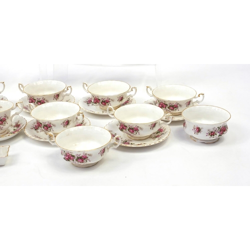 2139 - Royal Albert Lavender Rose tea and dinnerware including coffee pot, teapot, cups and saucers, the co... 