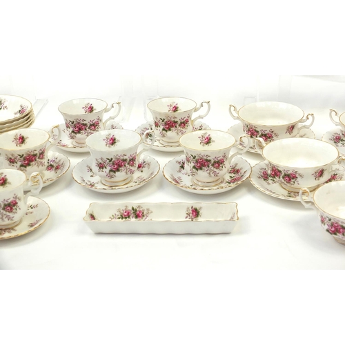 2139 - Royal Albert Lavender Rose tea and dinnerware including coffee pot, teapot, cups and saucers, the co... 