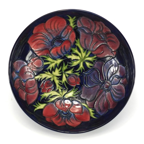 2108 - Moorcroft anemone patterned bowl hand painted and tube lined with flowers, 26cm in diameter