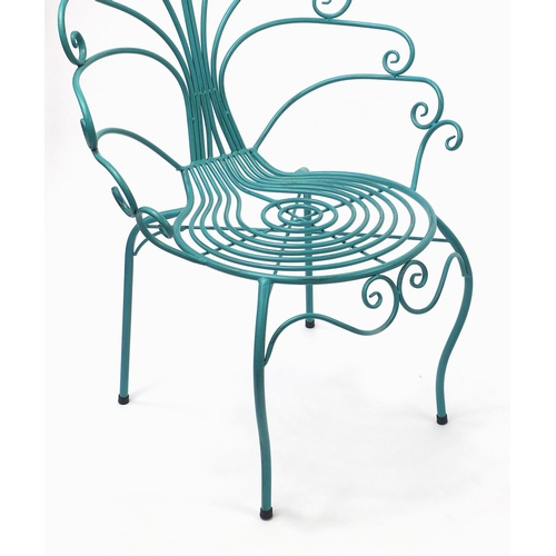 2060 - Turquoise painted metal table and chairs, the chairs 90cm high