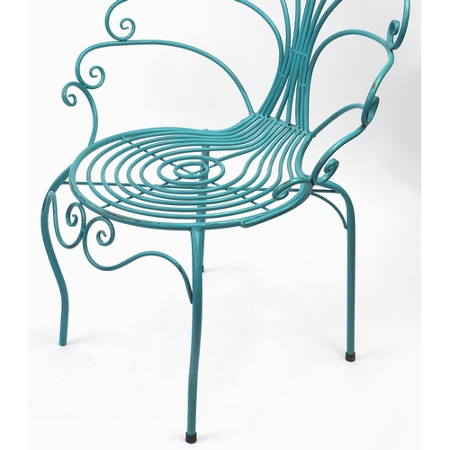 2060 - Turquoise painted metal table and chairs, the chairs 90cm high