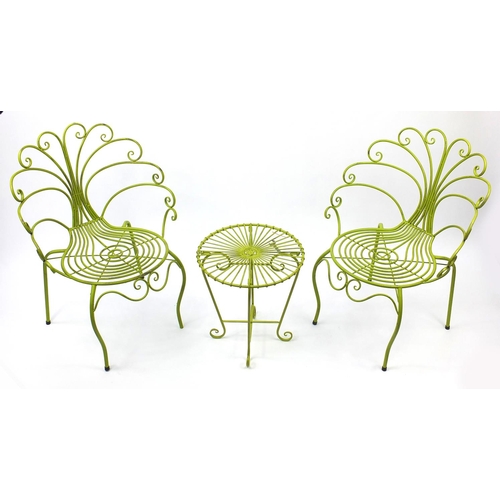 2061 - Green painted metal table and chairs, the chairs 90cm high