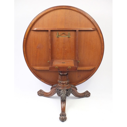 2015 - Good Regency rosewood circular centre table with lion paw feet, 71cm H x 136cm  diameter