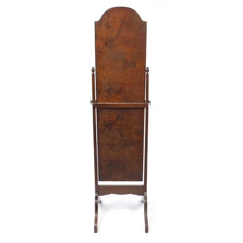 2052 - Oak framed cheval mirror with acorn finials, 158cm high