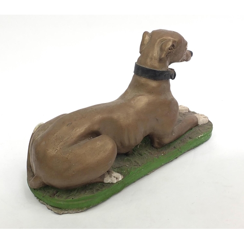 2068 - Painted stoneware garden statue greyhound, 60cm length