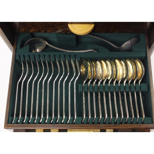 2067 - Good quality Art Deco oak cased canteen of silver plated cutlery with ivorine and Mother of Pearl ha... 