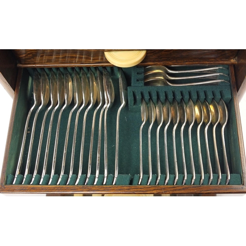 2067 - Good quality Art Deco oak cased canteen of silver plated cutlery with ivorine and Mother of Pearl ha... 