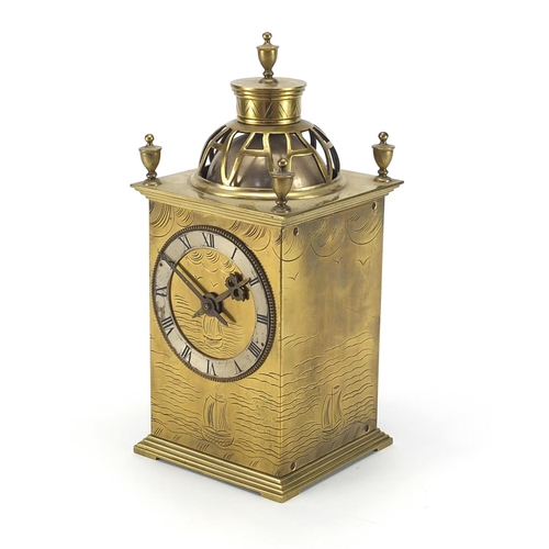 2137 - Brass lantern mantle clock engraved with boats, 22.5cm high