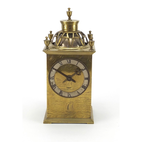 2137 - Brass lantern mantle clock engraved with boats, 22.5cm high