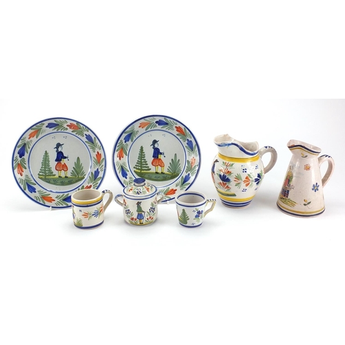 471 - Group of hand painted traditional French Quimper pottery including two jugs, plates, jam pot and cov... 