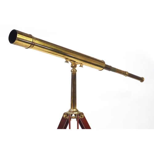 2070 - Floor standing brass telescope with brass and wooden tripod base, by Culpeper instruments Ltd Englan... 